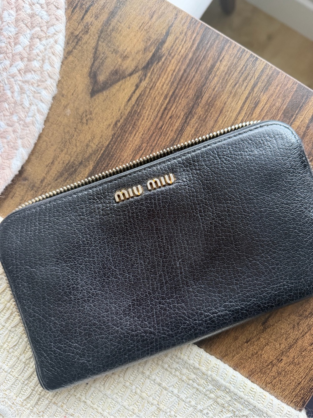 Miu Miu Black Pebbled Leather Zip Wallet Gold Hardware.